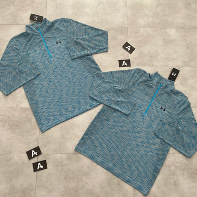 UA SEEMLESS HALF ZIP